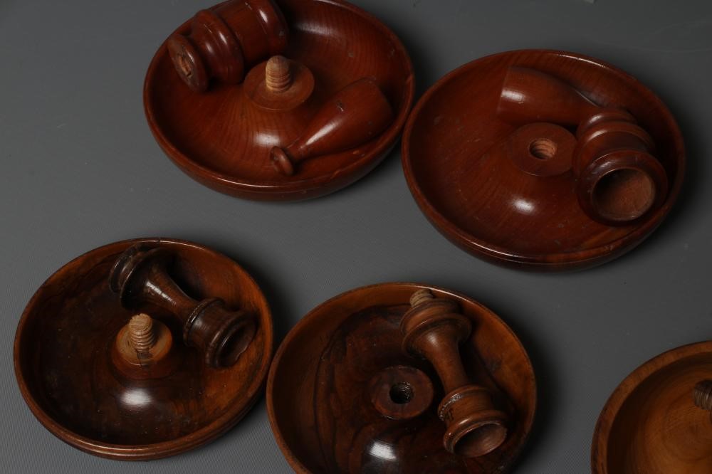 FOUR 19TH CENTURY TREEN BUN FORM TRAVELLING CANDLESTICKS Image