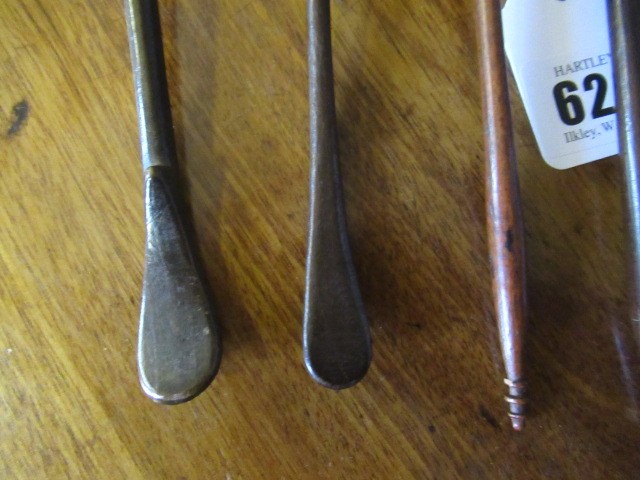 FIVE 19TH CENTURY TREEN TODDY LADLES each with rounded bowl and protruding lip, three with rounded Image