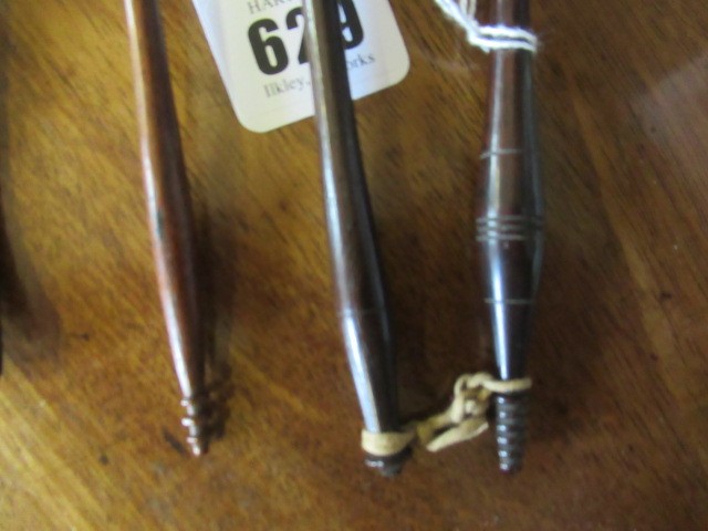 FIVE 19TH CENTURY TREEN TODDY LADLES each with rounded bowl and protruding lip, three with rounded Image