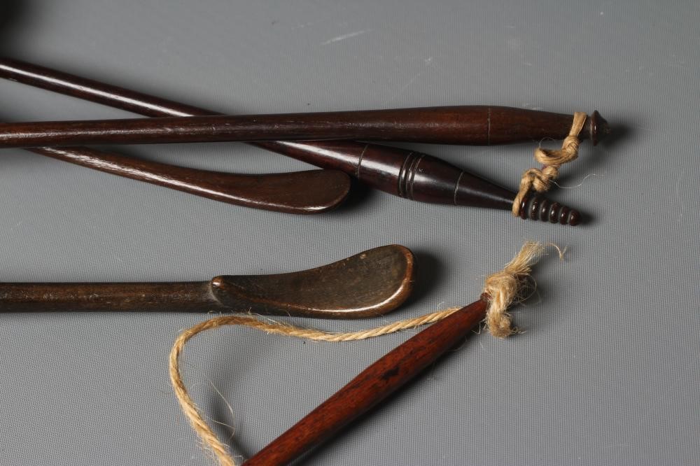 FIVE 19TH CENTURY TREEN TODDY LADLES each with rounded bowl and protruding lip, three with rounded Image