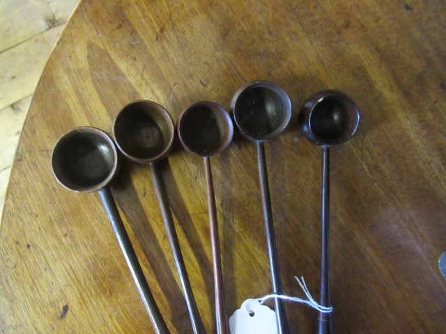 FIVE 19TH CENTURY TREEN TODDY LADLES each with rounded bowl and protruding lip, three with rounded Image