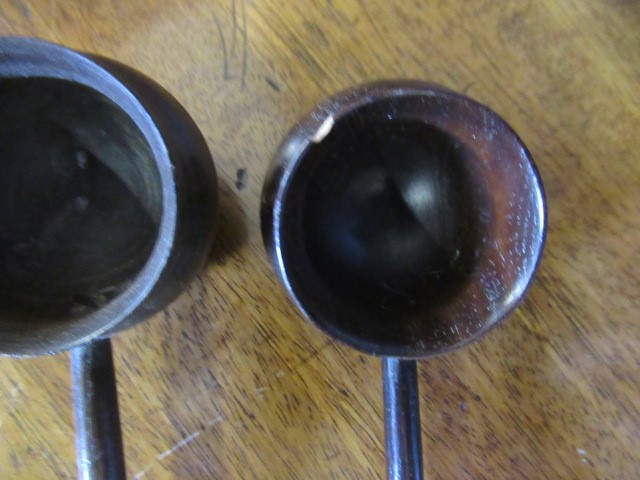 FIVE 19TH CENTURY TREEN TODDY LADLES each with rounded bowl and protruding lip, three with rounded Image