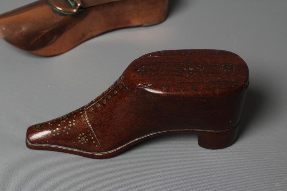 A 19TH CENTURY MAHOGANY SHOE SNUFF BOX with sliding cover and brass tack pique work to the front and Image