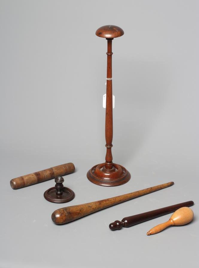 A COLLECTION OF 19TH CENTURY TREEN, comprising of a baton, scroll holder, sailor's fid, candlestick Image
