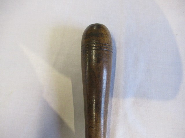 A COLLECTION OF 19TH CENTURY TREEN, comprising of a baton, scroll holder, sailor's fid, candlestick Image