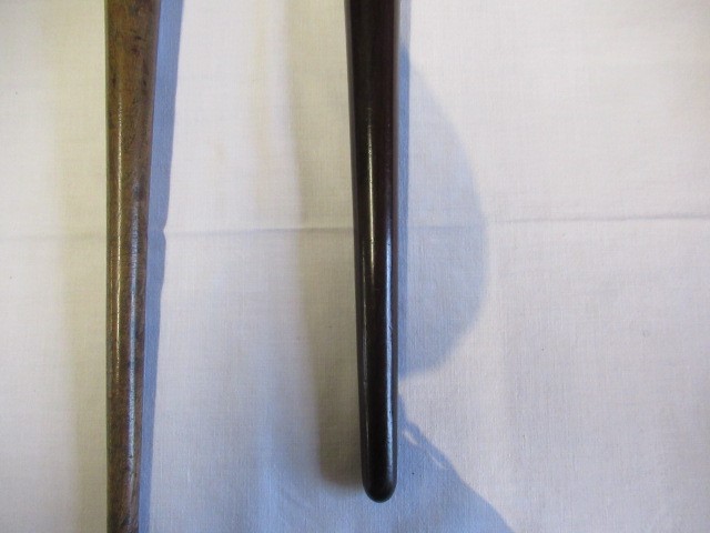 A COLLECTION OF 19TH CENTURY TREEN, comprising of a baton, scroll holder, sailor's fid, candlestick Image