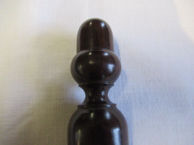 A COLLECTION OF 19TH CENTURY TREEN, comprising of a baton, scroll holder, sailor's fid, candlestick Image