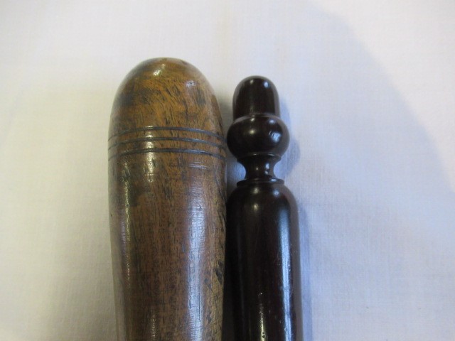 A COLLECTION OF 19TH CENTURY TREEN, comprising of a baton, scroll holder, sailor's fid, candlestick Image