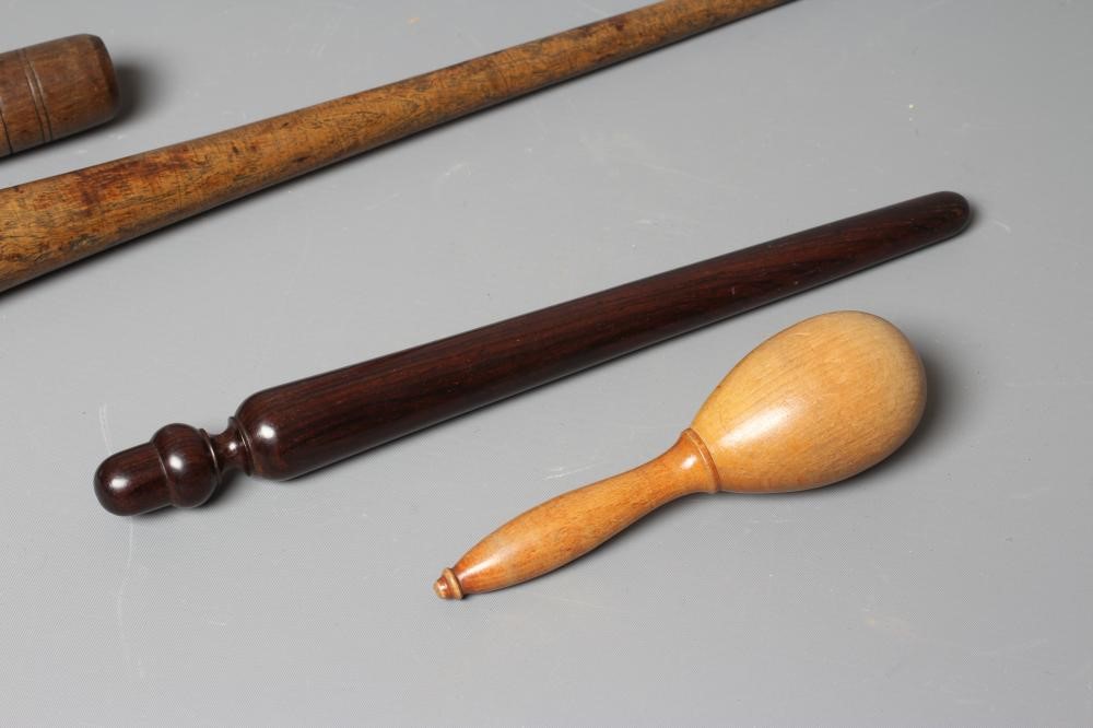 A COLLECTION OF 19TH CENTURY TREEN, comprising of a baton, scroll holder, sailor's fid, candlestick Image