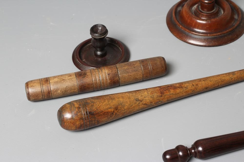 A COLLECTION OF 19TH CENTURY TREEN, comprising of a baton, scroll holder, sailor's fid, candlestick Image