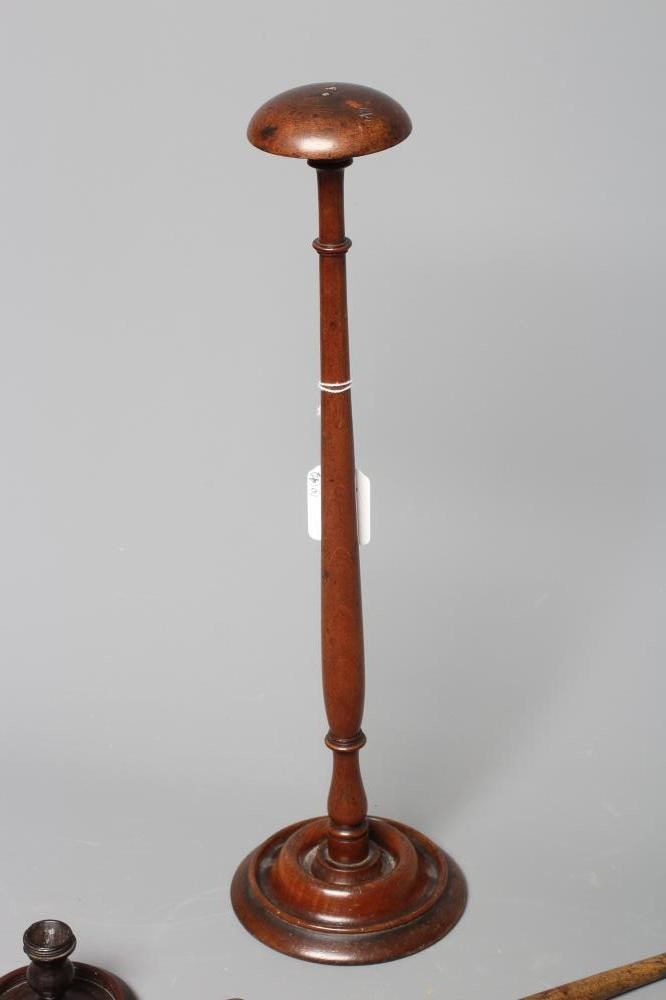 A COLLECTION OF 19TH CENTURY TREEN, comprising of a baton, scroll holder, sailor's fid, candlestick Image