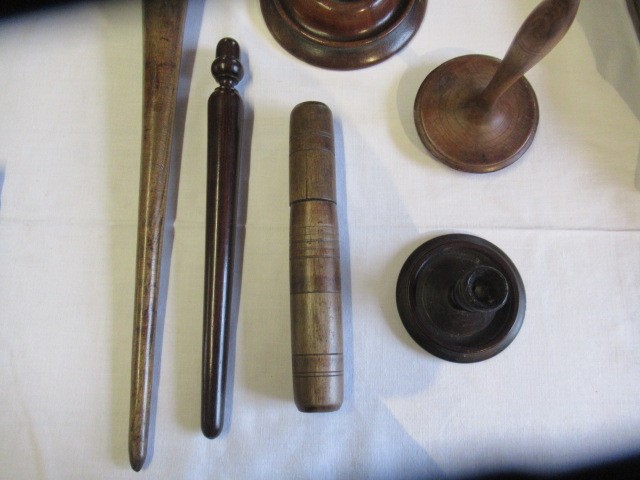 A COLLECTION OF 19TH CENTURY TREEN, comprising of a baton, scroll holder, sailor's fid, candlestick Image