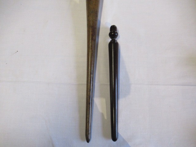 A COLLECTION OF 19TH CENTURY TREEN, comprising of a baton, scroll holder, sailor's fid, candlestick Image