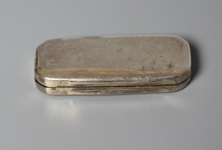 A LATE GEORGE III SILVER VINAIGRETTE by Samuel Pemberton, Birmingham 1807, of plain oblong form, the Image