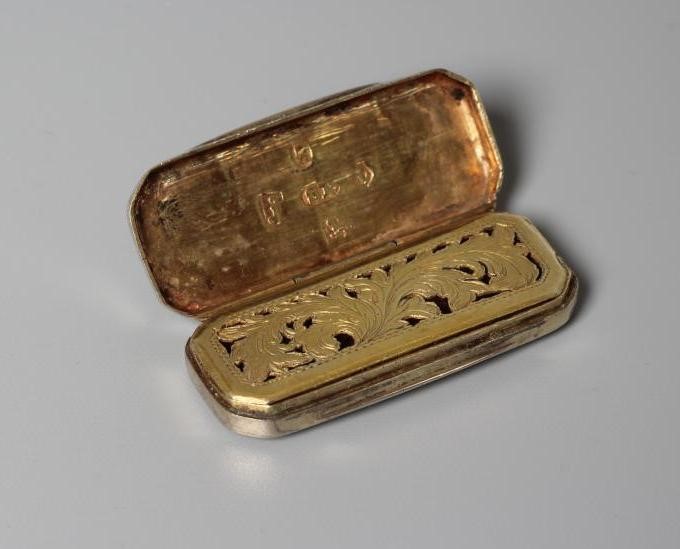 A LATE GEORGE III SILVER VINAIGRETTE by Samuel Pemberton, Birmingham 1807, of plain oblong form, the Image