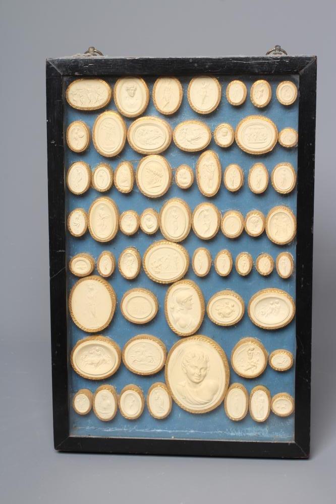A COLLECTION OF FIFTY EIGHT ITALIAN 19TH CENTURY GRAND TOUR PLASTER INTAGLIO MEDALLIONS, depicting Image