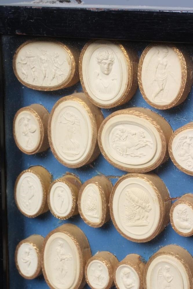 A COLLECTION OF FIFTY EIGHT ITALIAN 19TH CENTURY GRAND TOUR PLASTER INTAGLIO MEDALLIONS, depicting Image