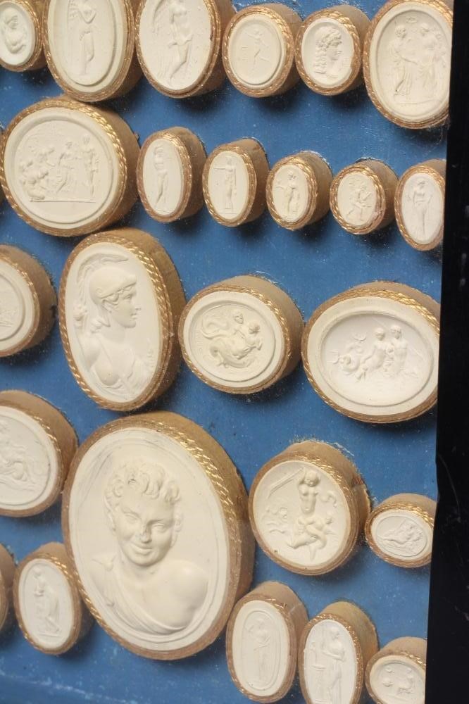 A COLLECTION OF FIFTY EIGHT ITALIAN 19TH CENTURY GRAND TOUR PLASTER INTAGLIO MEDALLIONS, depicting Image