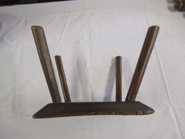 A 19TH CENTURY ASH AND ELM MILKING STOOL, the oblong seat raised on four circular tapering legs, 13 Image