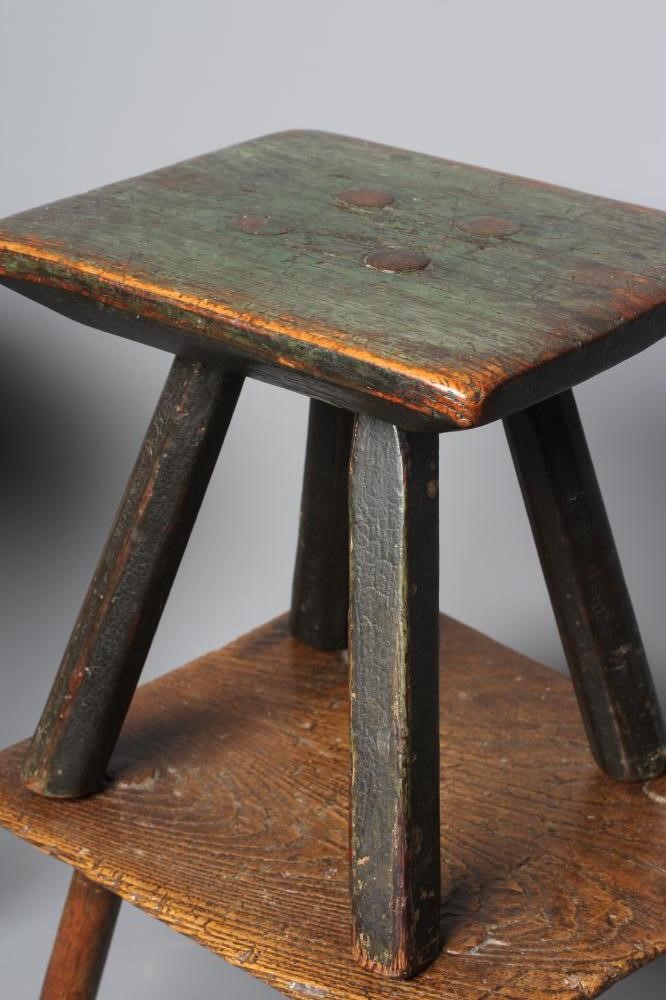 A 19TH CENTURY ASH AND ELM MILKING STOOL, the oblong seat raised on four circular tapering legs, 13 Image