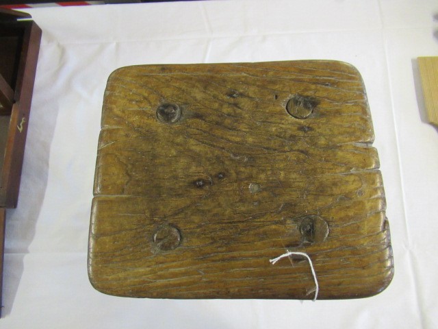 A 19TH CENTURY ASH AND ELM MILKING STOOL, the oblong seat raised on four circular tapering legs, 13 Image