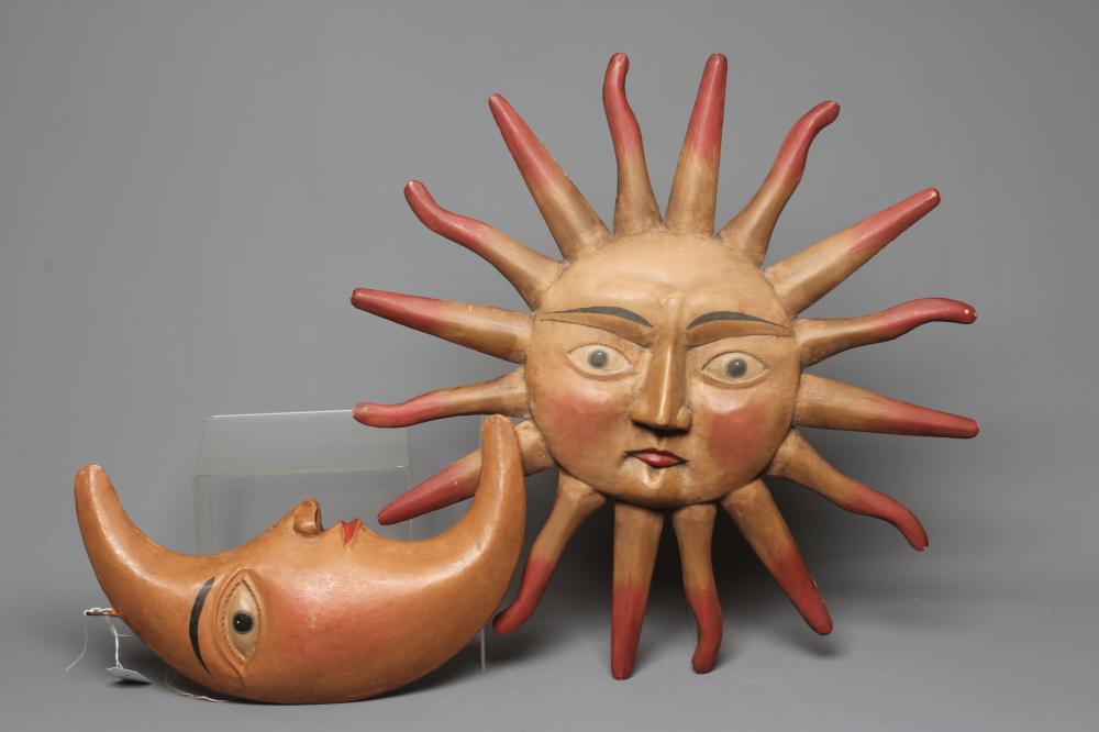 AN EARLY 20TH CENTURY FOLK ART TOLEWARE CRESCENT MOON FACE Image