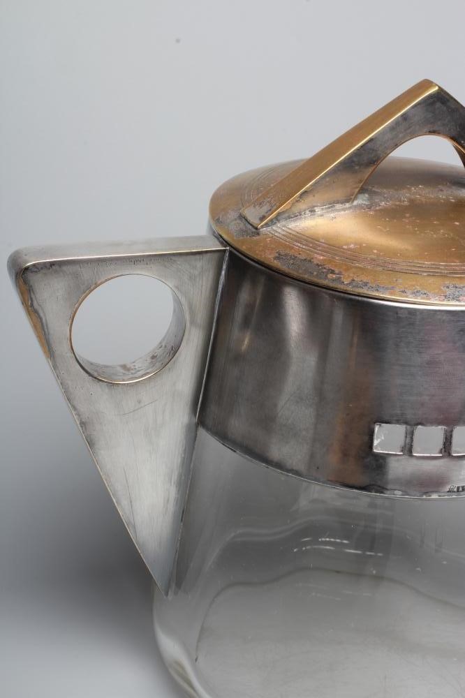 JUTTA SIKA FOR THE WIENER WERKSTATTE - A clear glass "Meteor" biscuit barrel of tapering cylindrical Image