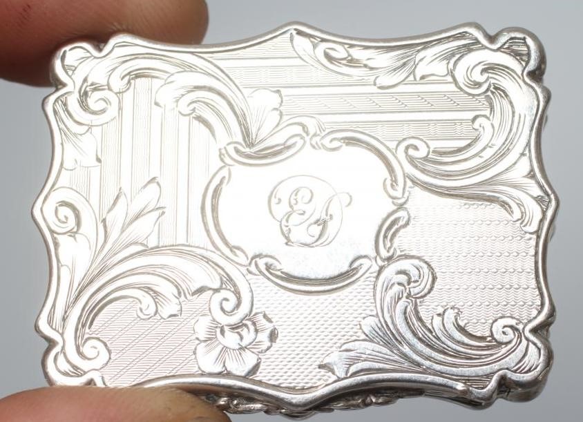 AN EARLY VICTORIAN SILVER VINAIGRETTE by Nathaniel Mills Image