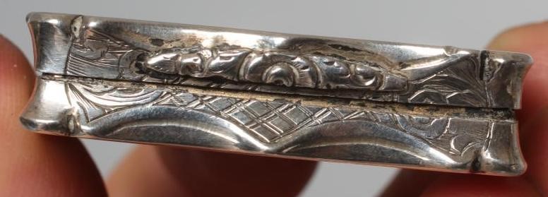 AN EARLY VICTORIAN SILVER VINAIGRETTE by Nathaniel Mills Image