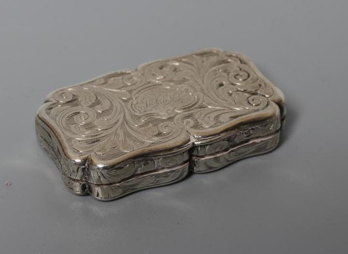 AN EARLY VICTORIAN SILVER VINAIGRETTE by Nathaniel Mills Image
