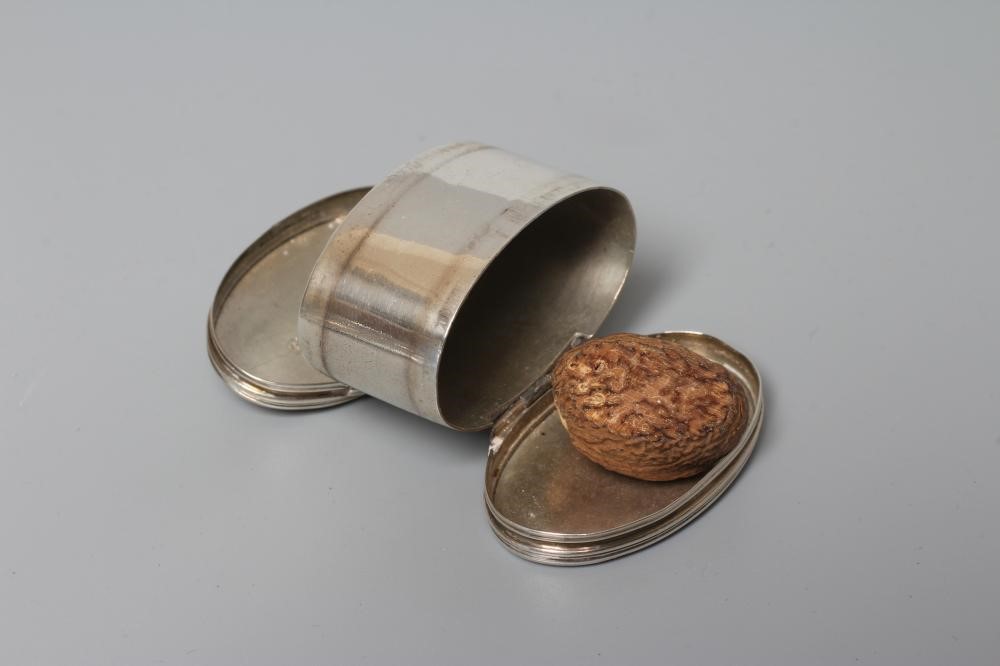 A LATE GEORGE III SILVER NUTMEG GRATER by Peter and Ann Bateman Image