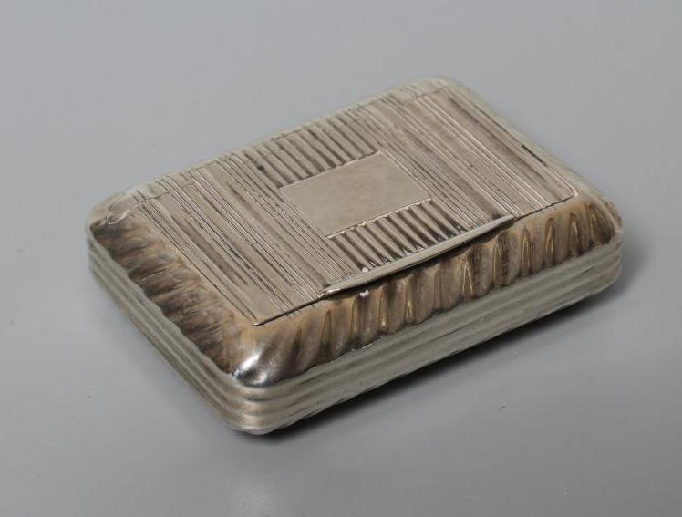 A LATE GEORGE III SILVER SNUFF BOX by William Pugh, Birmingham 1816, of plain rounded oblong form Image