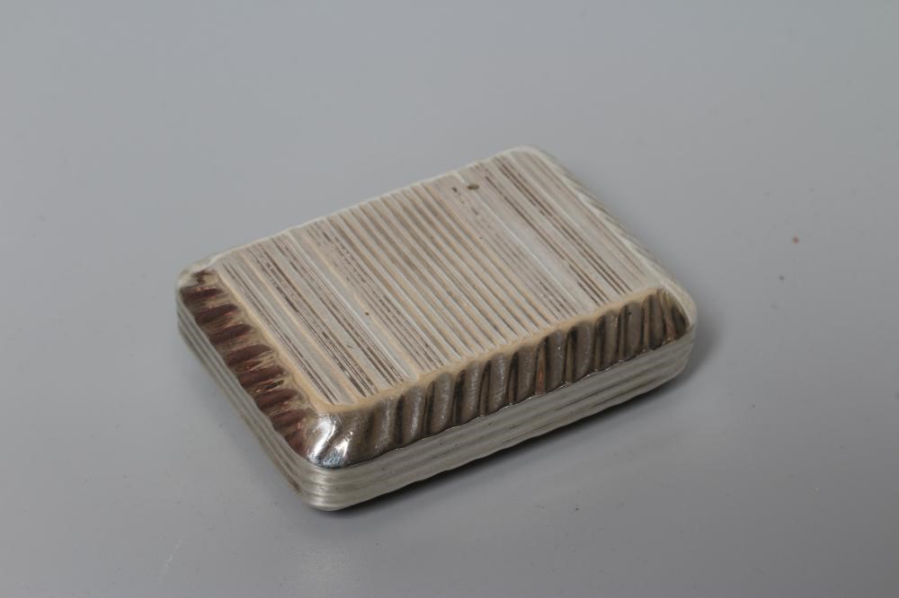 A LATE GEORGE III SILVER SNUFF BOX by William Pugh, Birmingham 1816, of plain rounded oblong form Image