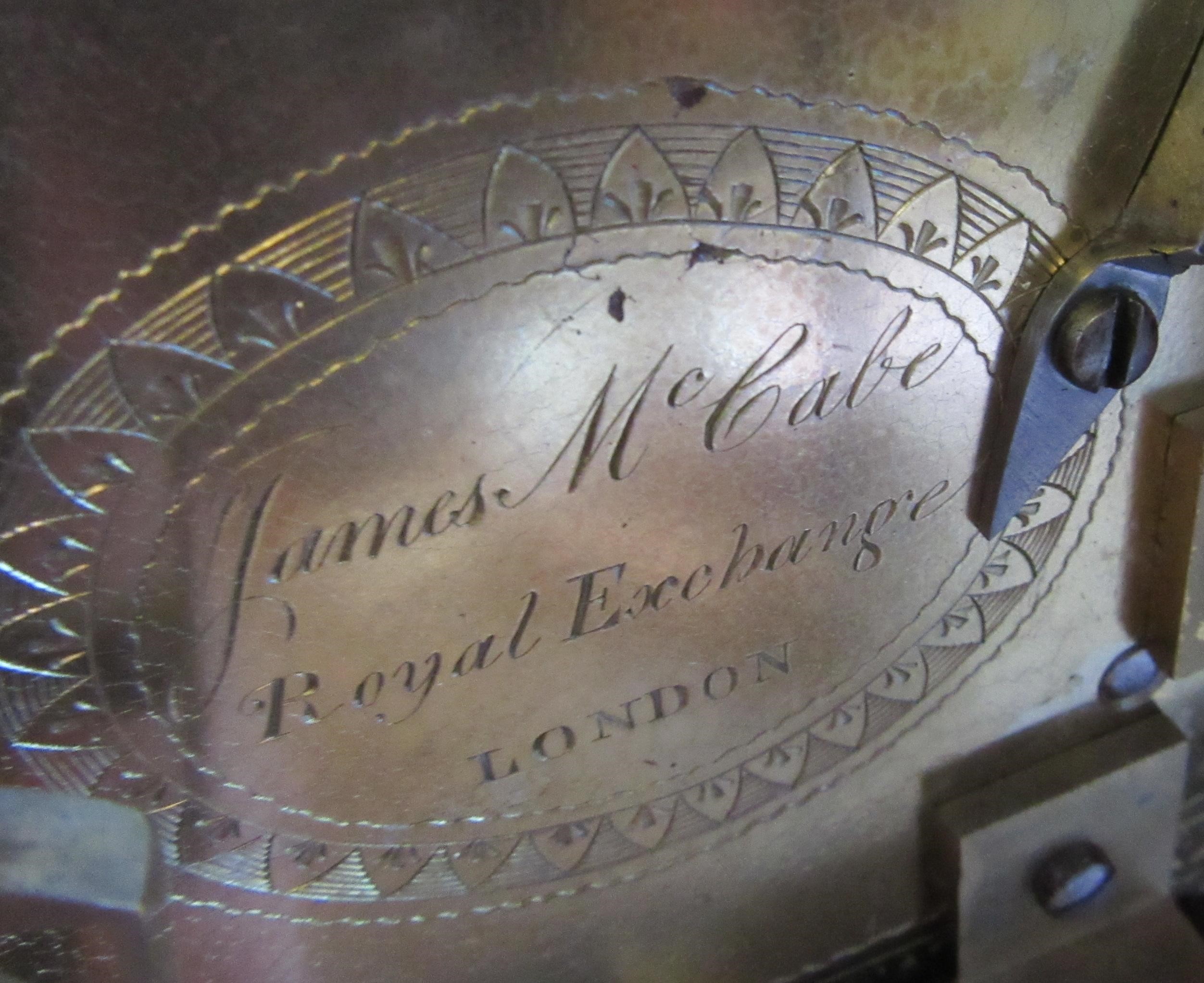A MAHOGANY CASED MANTEL CLOCK BY JAMES McCABE Image