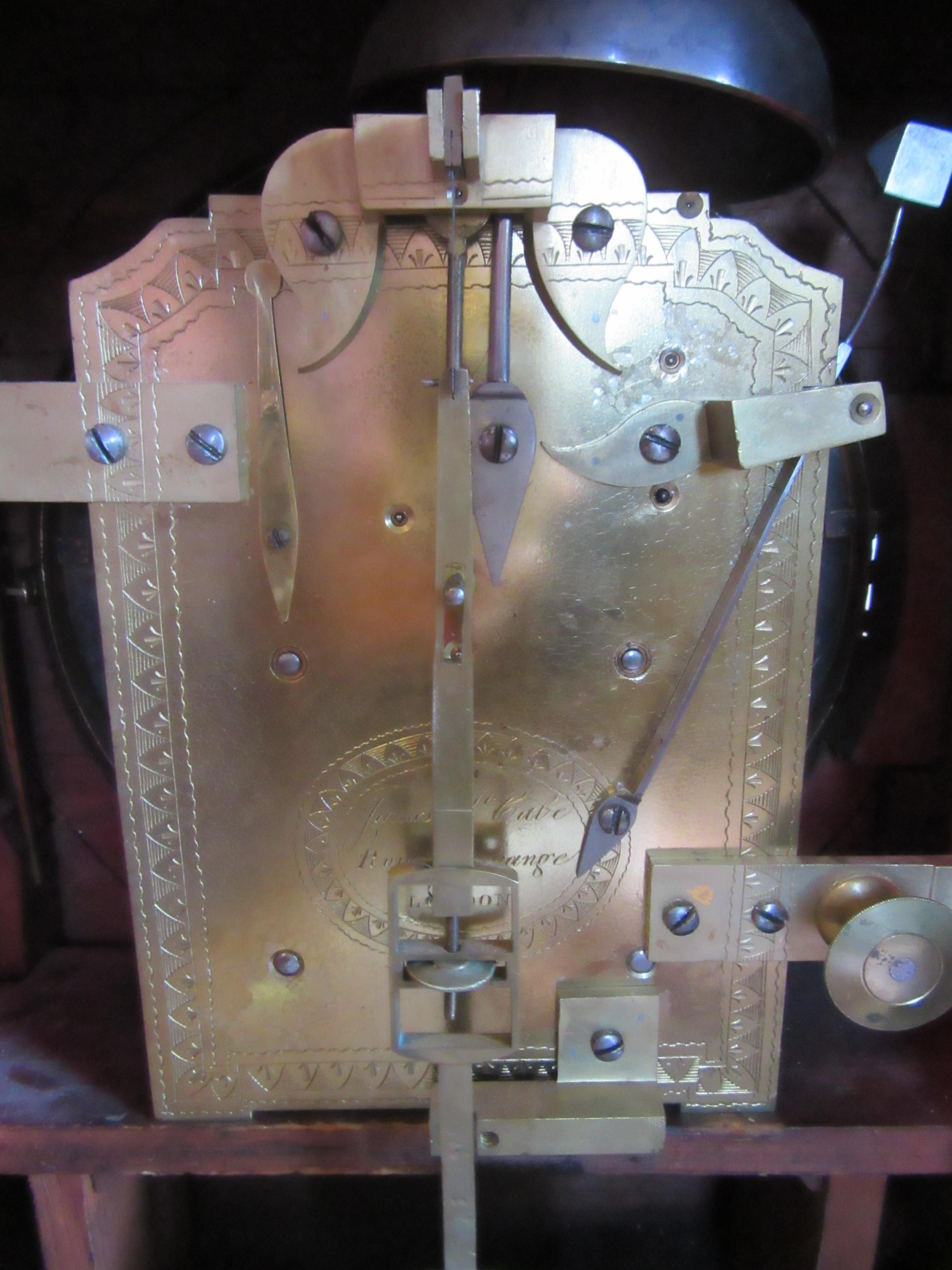 A MAHOGANY CASED MANTEL CLOCK BY JAMES McCABE Image