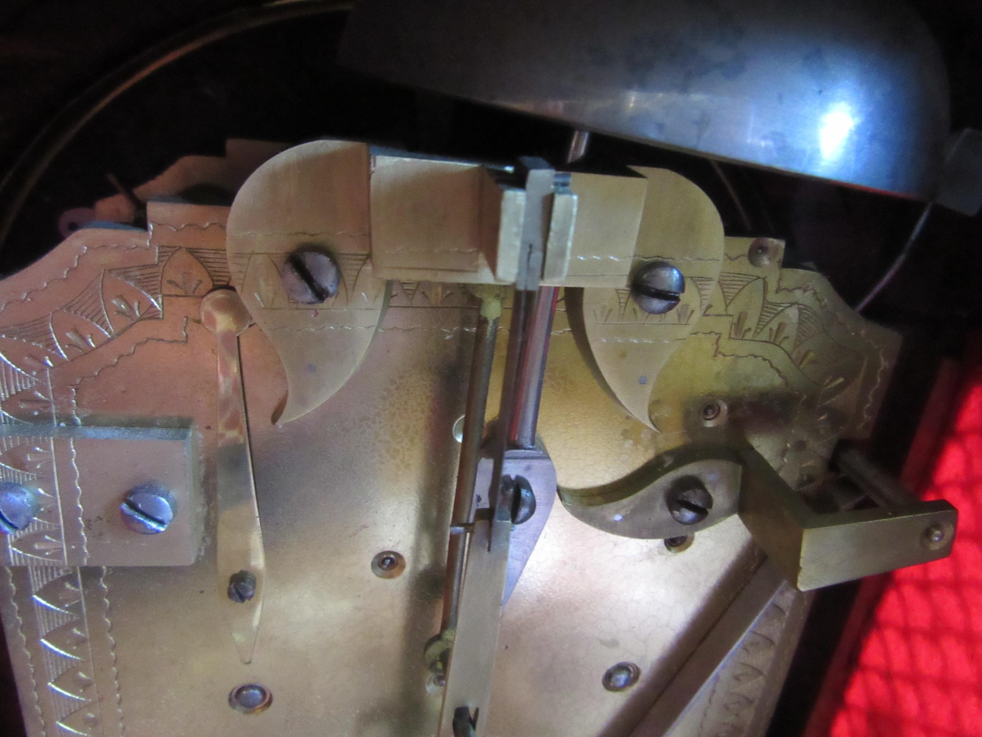 A MAHOGANY CASED MANTEL CLOCK BY JAMES McCABE Image