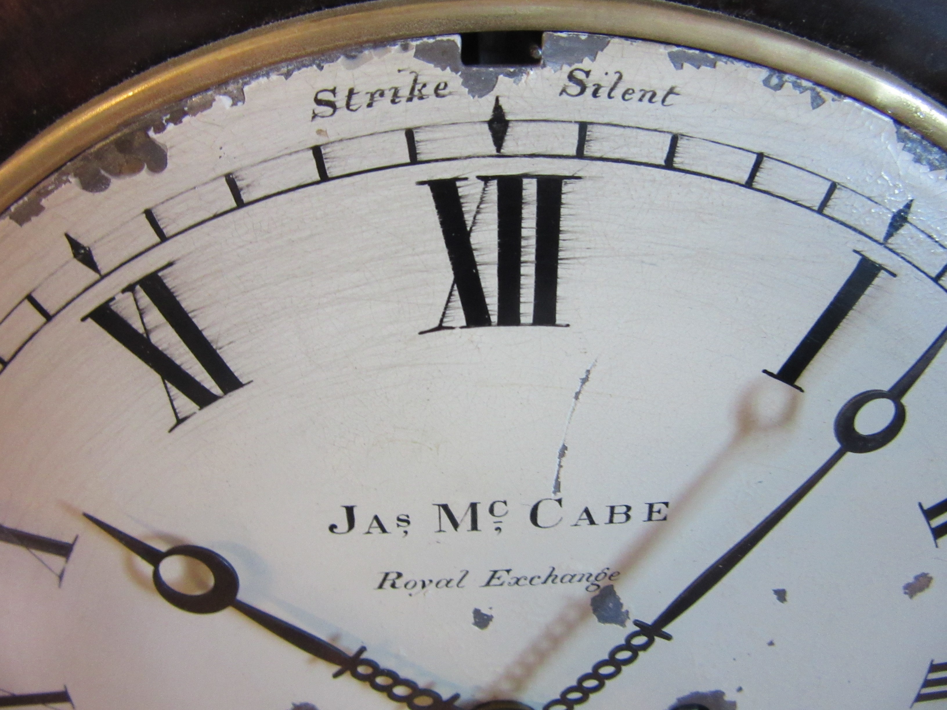 A MAHOGANY CASED MANTEL CLOCK BY JAMES McCABE Image