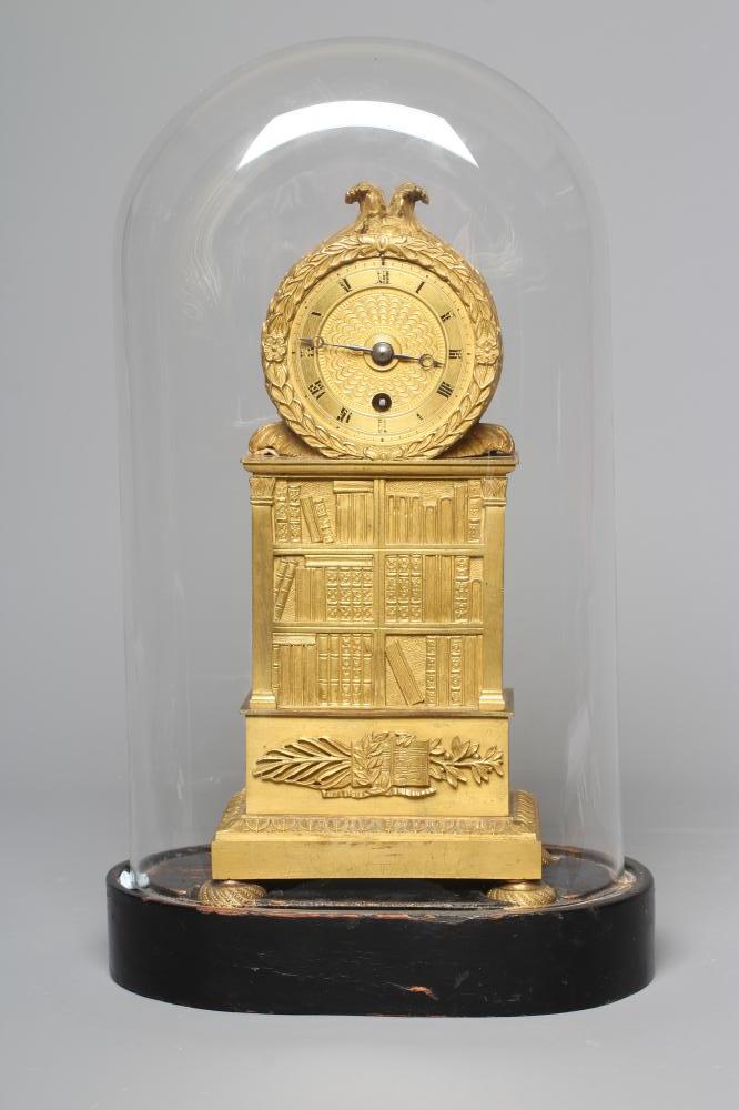 A FRENCH EMPIRE ORMOLU CASED LIBRARY TIMEPIECE Image