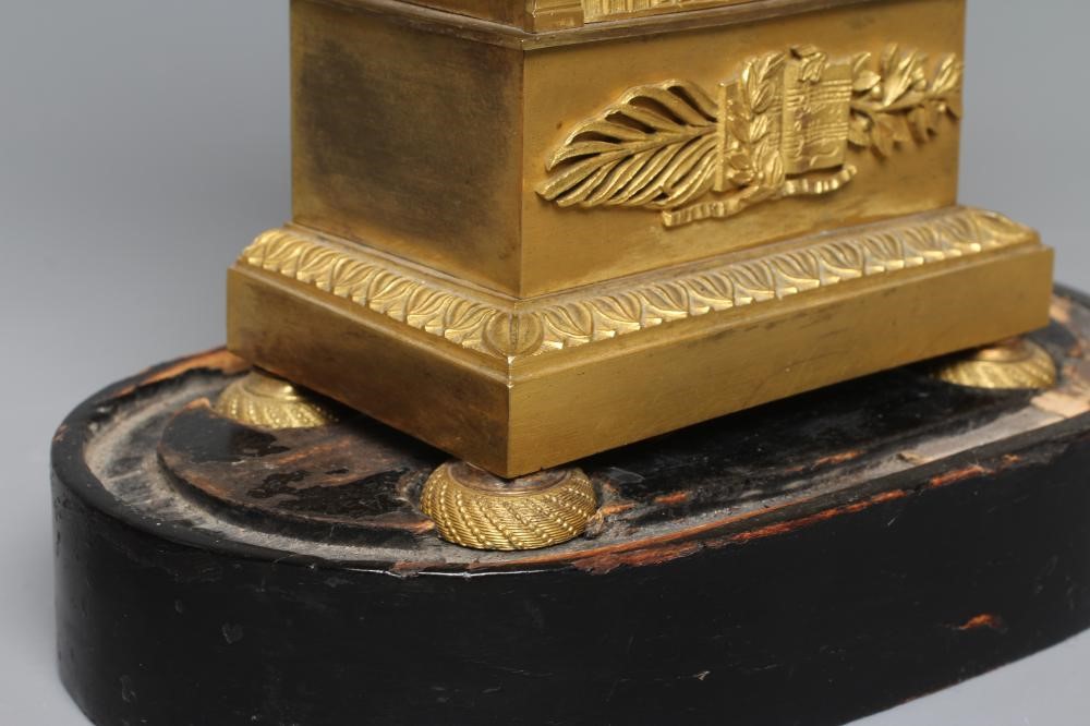 A FRENCH EMPIRE ORMOLU CASED LIBRARY TIMEPIECE Image