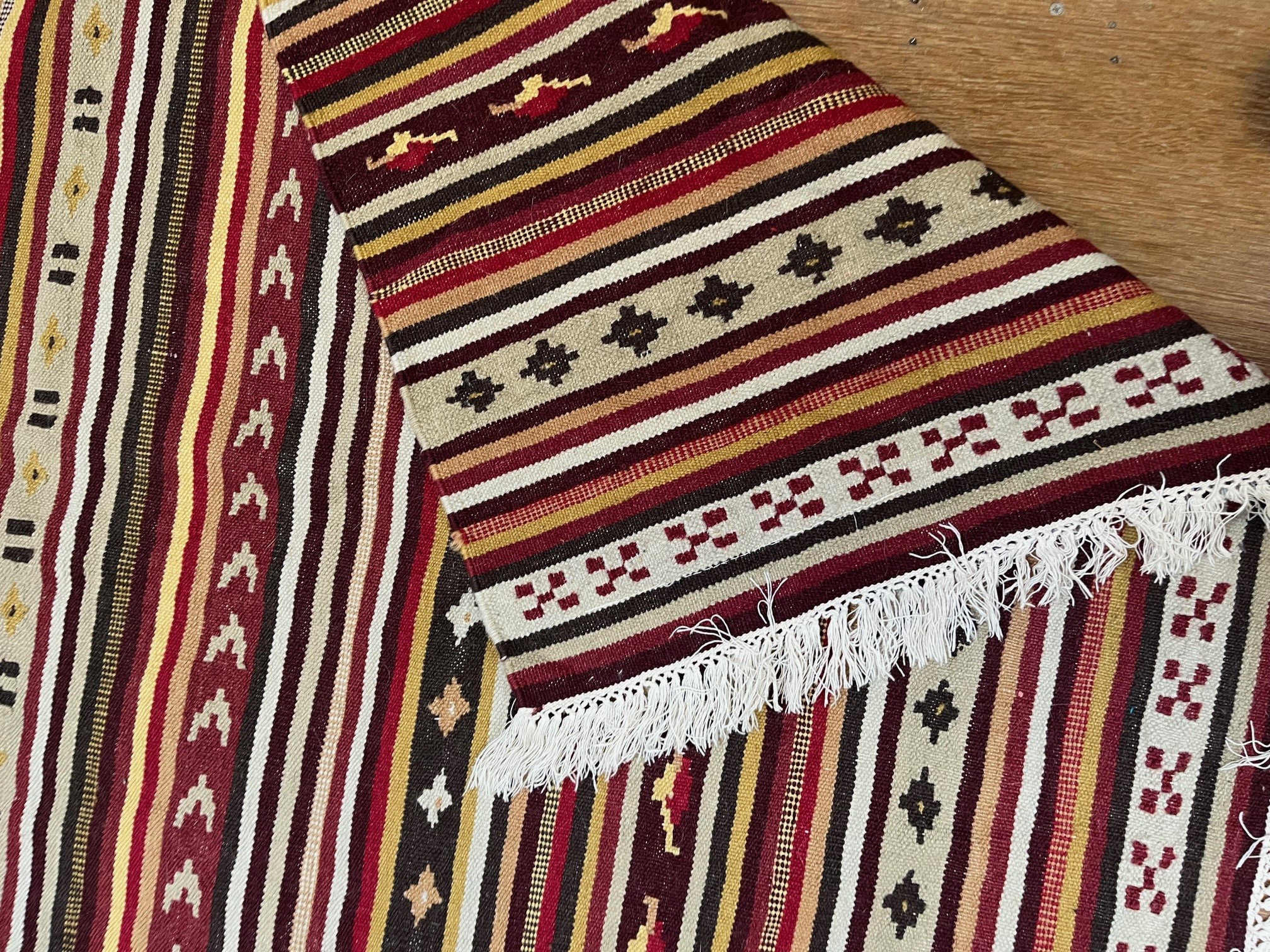 A TURKISH KILM, modern, in all-over striped pattern in shades of red and ivory, 76" x 54" Image