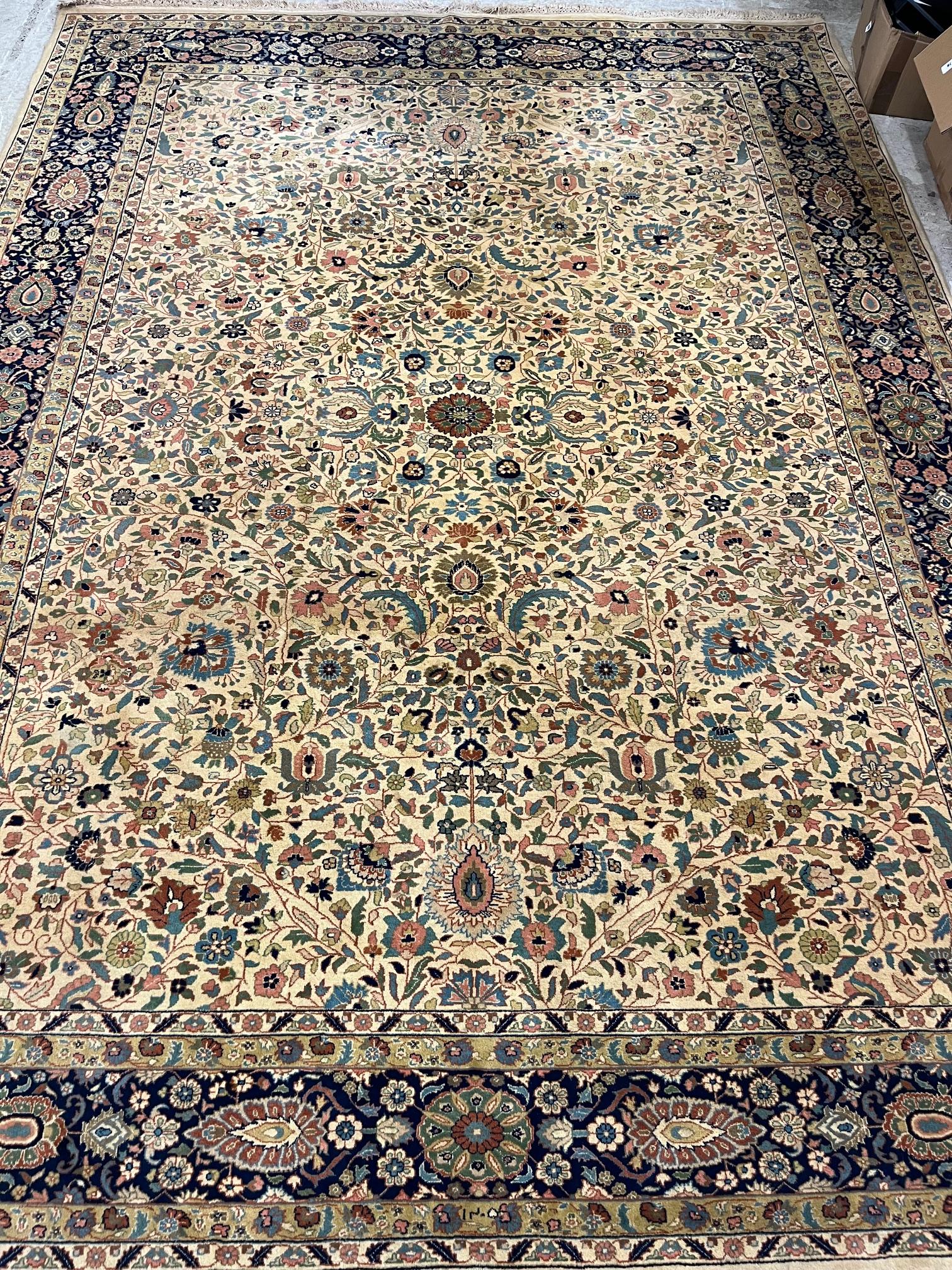 A PERSIAN KASHAN CARPET, second half 20th century, the ivory field with all-over trailing vine, Image