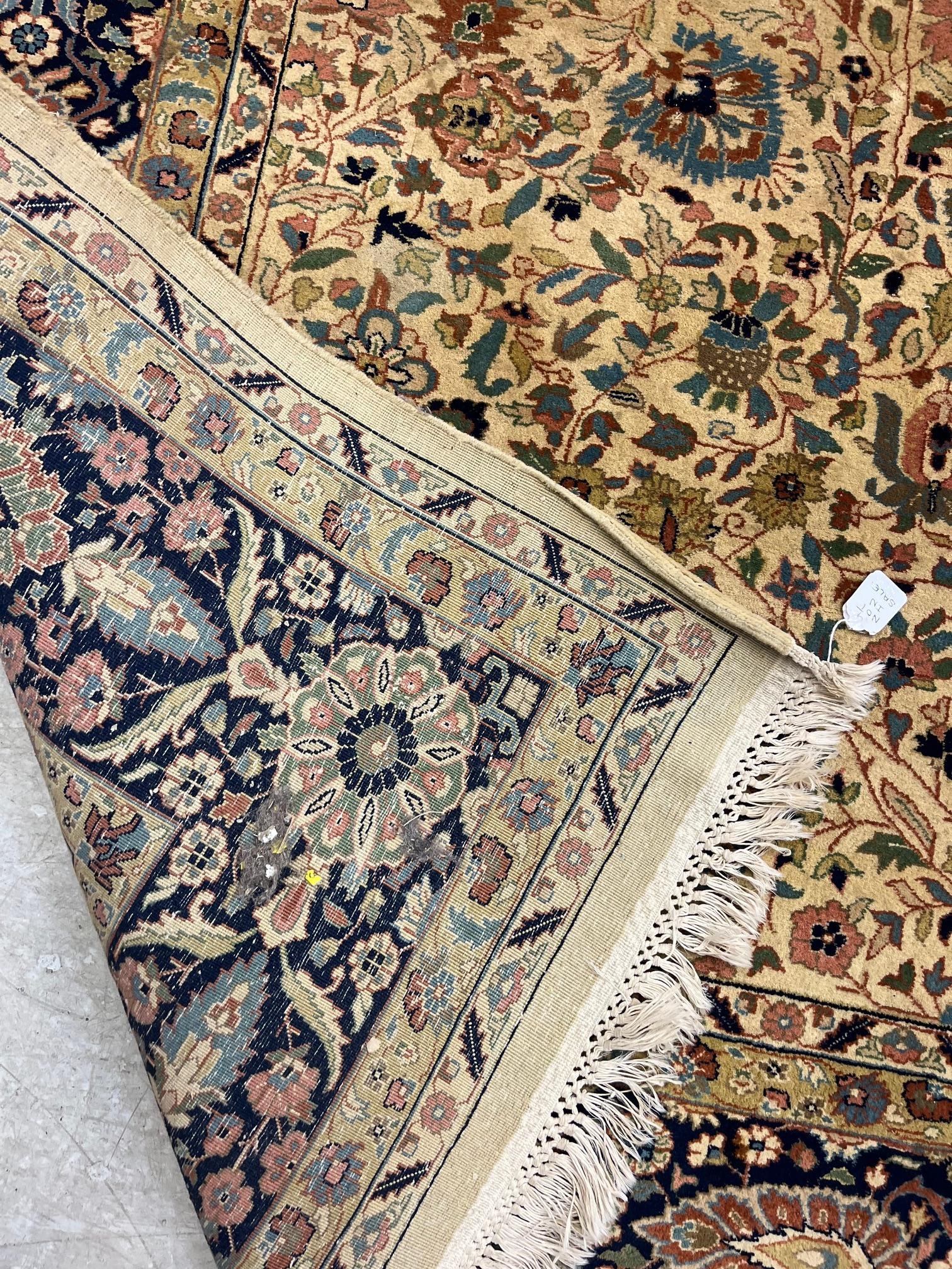 A PERSIAN KASHAN CARPET, second half 20th century, the ivory field with all-over trailing vine, Image