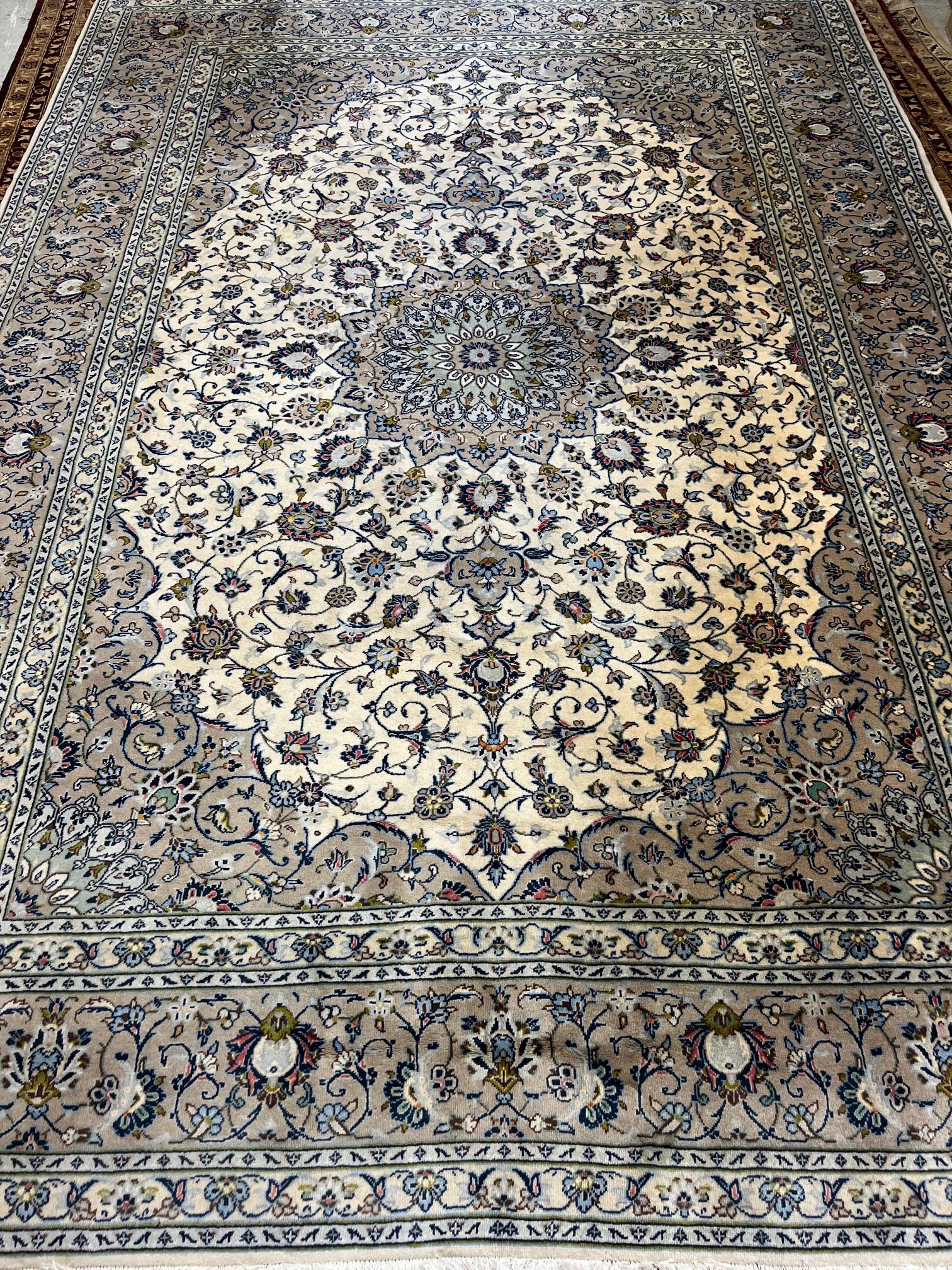 A PERSIAN KASHAN CARPET Image