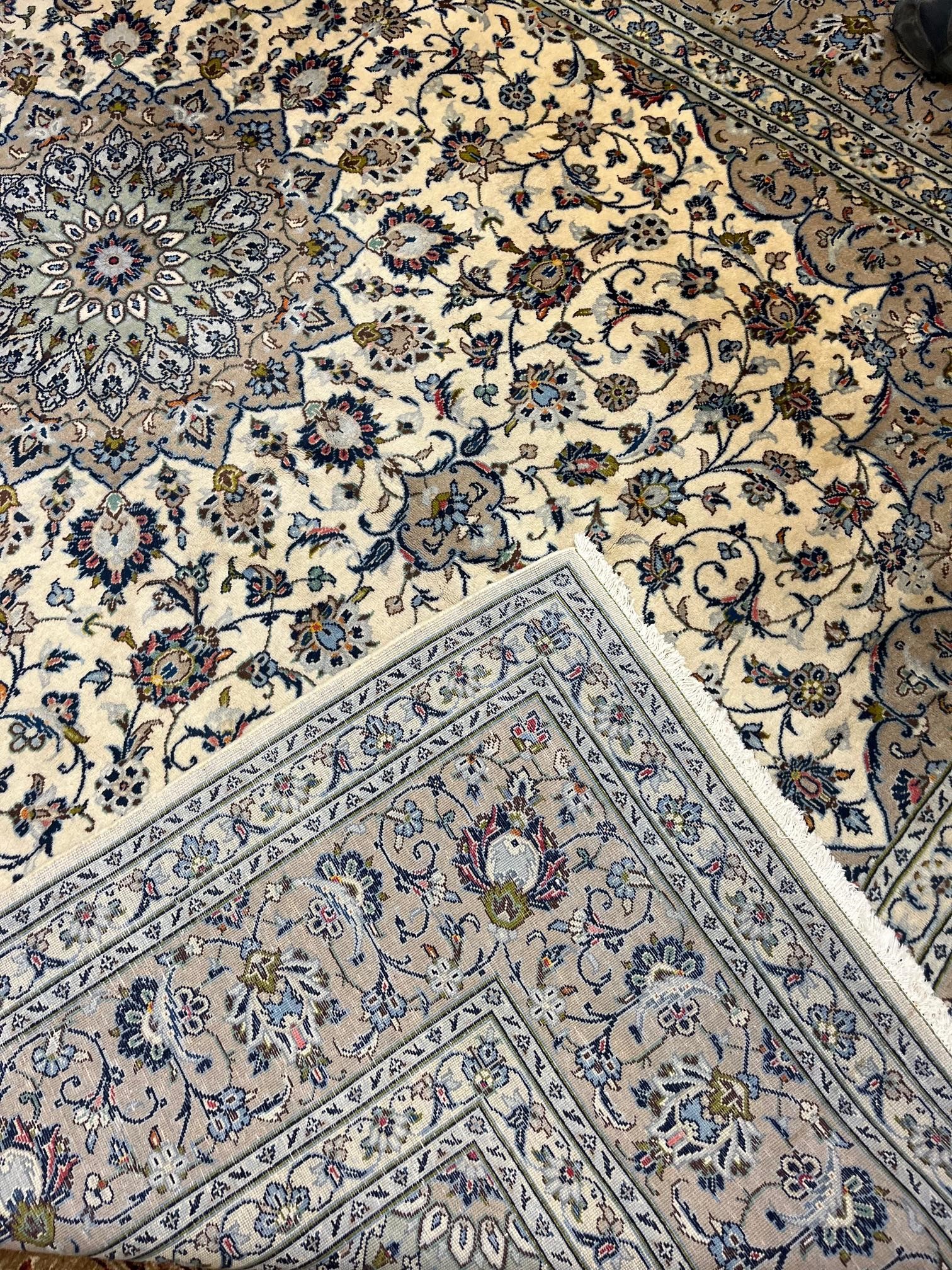 A PERSIAN KASHAN CARPET Image