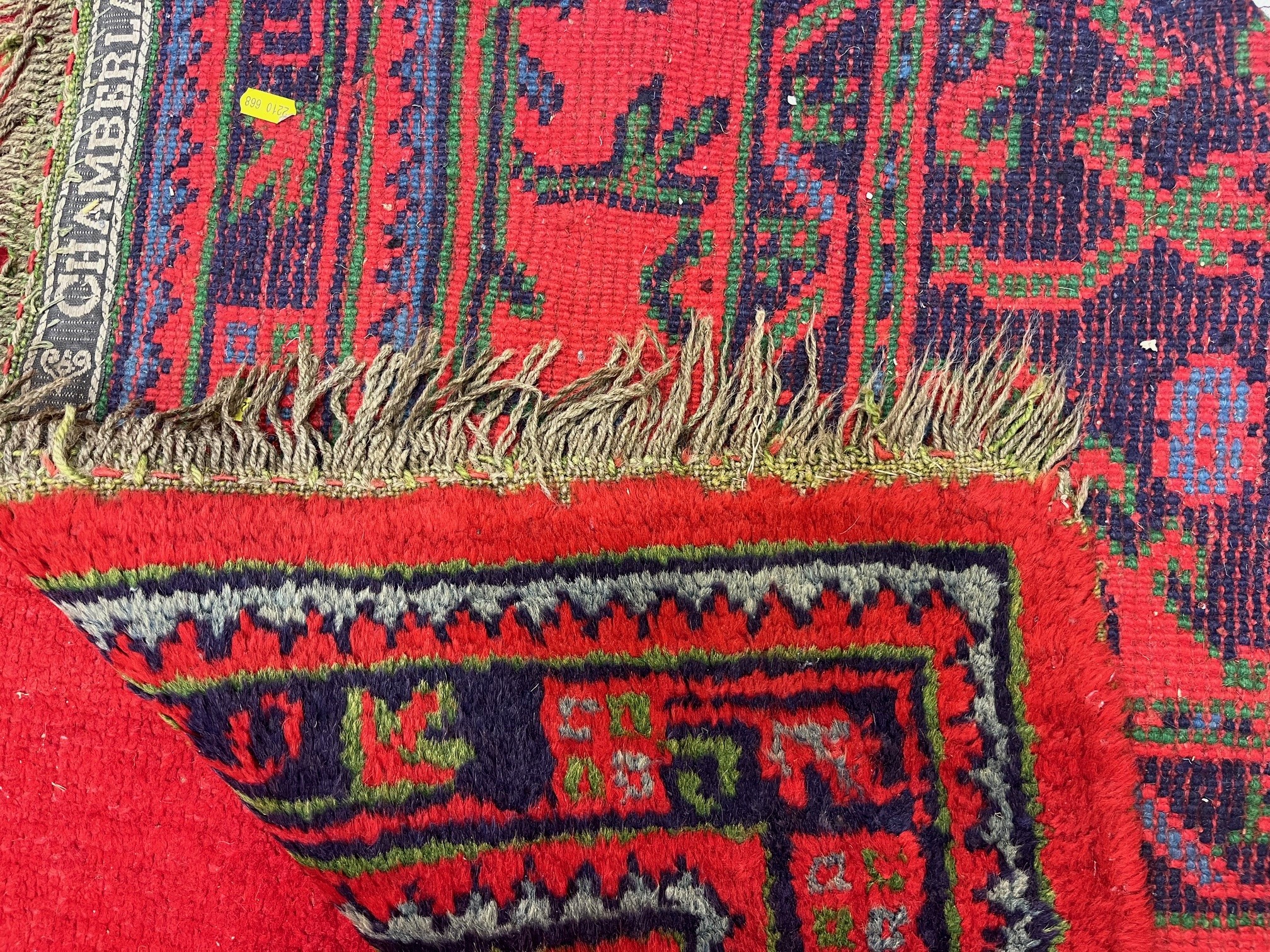 A TURKISH USHAK RED GROUND WOOL CARPET Image