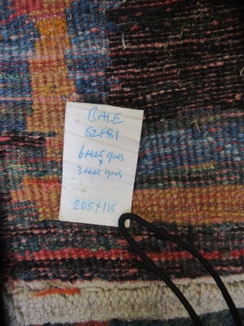 A SOUTH PERSIAN GABBEH RUG, the deep pile with a grid pattern in shades of blue, green, ochre and Image