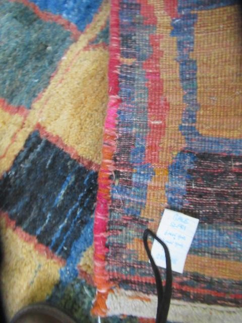 A SOUTH PERSIAN GABBEH RUG, the deep pile with a grid pattern in shades of blue, green, ochre and Image