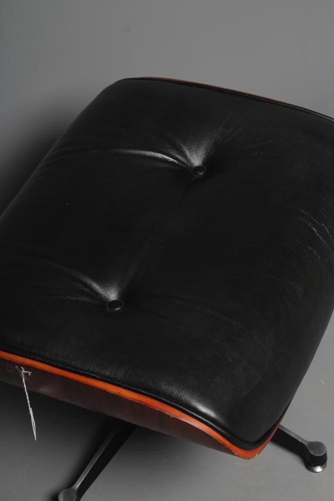 AFTER CHARLES AND RAY EAMES - A MODEL 671 OTTOMAN, modern, in Santos Palisander and black leather, Image