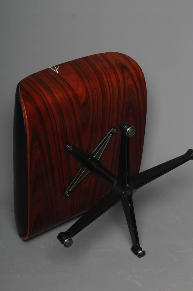 AFTER CHARLES AND RAY EAMES - A MODEL 671 OTTOMAN, modern, in Santos Palisander and black leather, Image