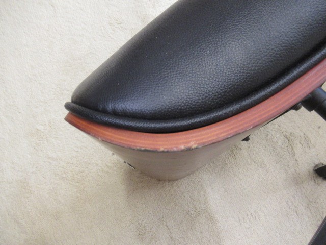 AFTER CHARLES AND RAY EAMES - A MODEL 671 OTTOMAN, modern, in Santos Palisander and black leather, Image